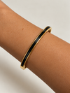 Brazalete Elegancia Onyx Dorado BRAVATA, detalle 2: banda rígida lisa con inserto negro central