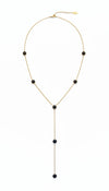 Collar lariat dorado con discos negros esmaltados en acero con baño de oro 18K