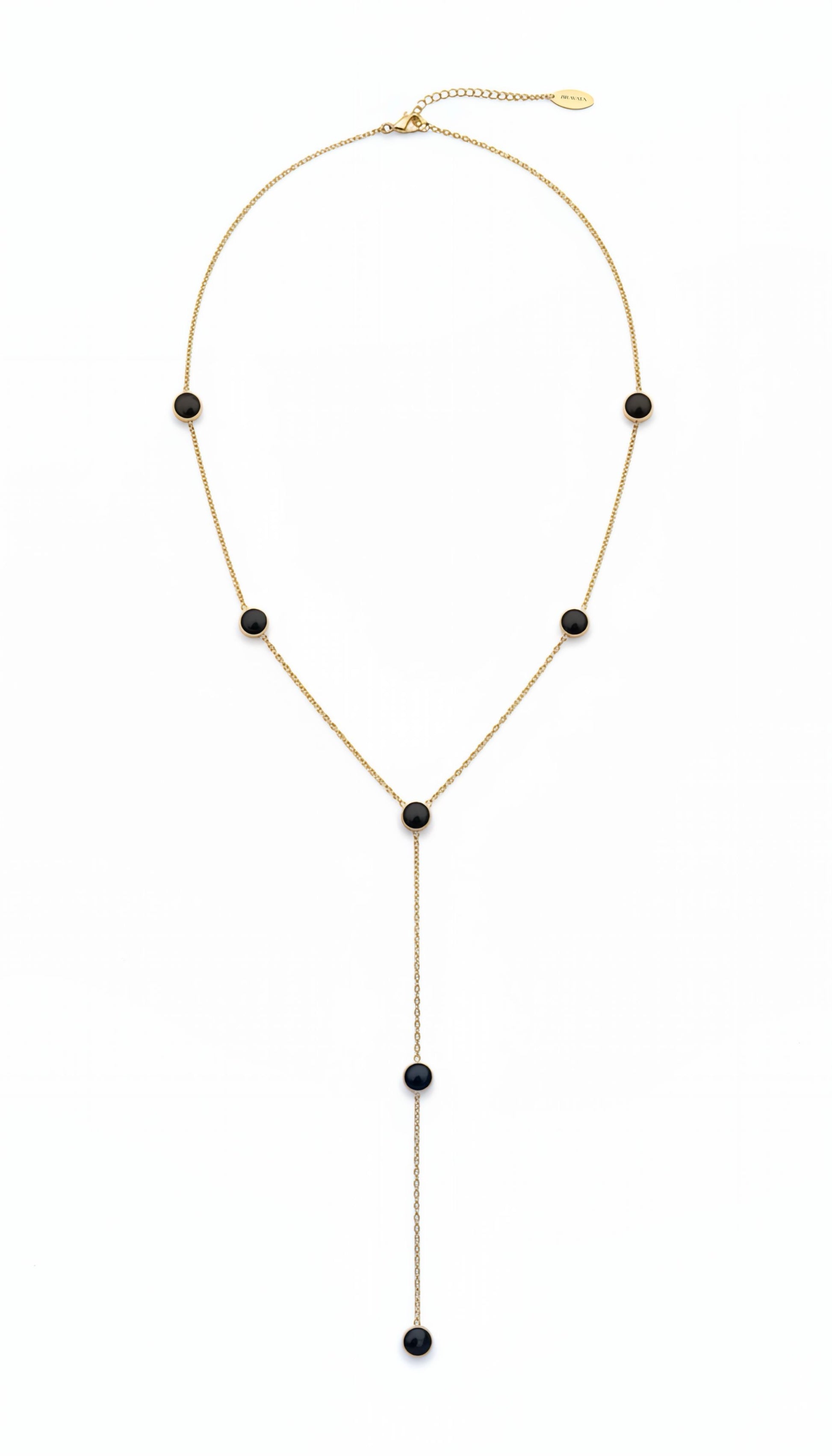 Collar lariat dorado con discos negros esmaltados en acero con baño de oro 18K