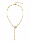 Collar lariat dorado con cuenta pavé y terminal esférico en acero con baño de oro 18K