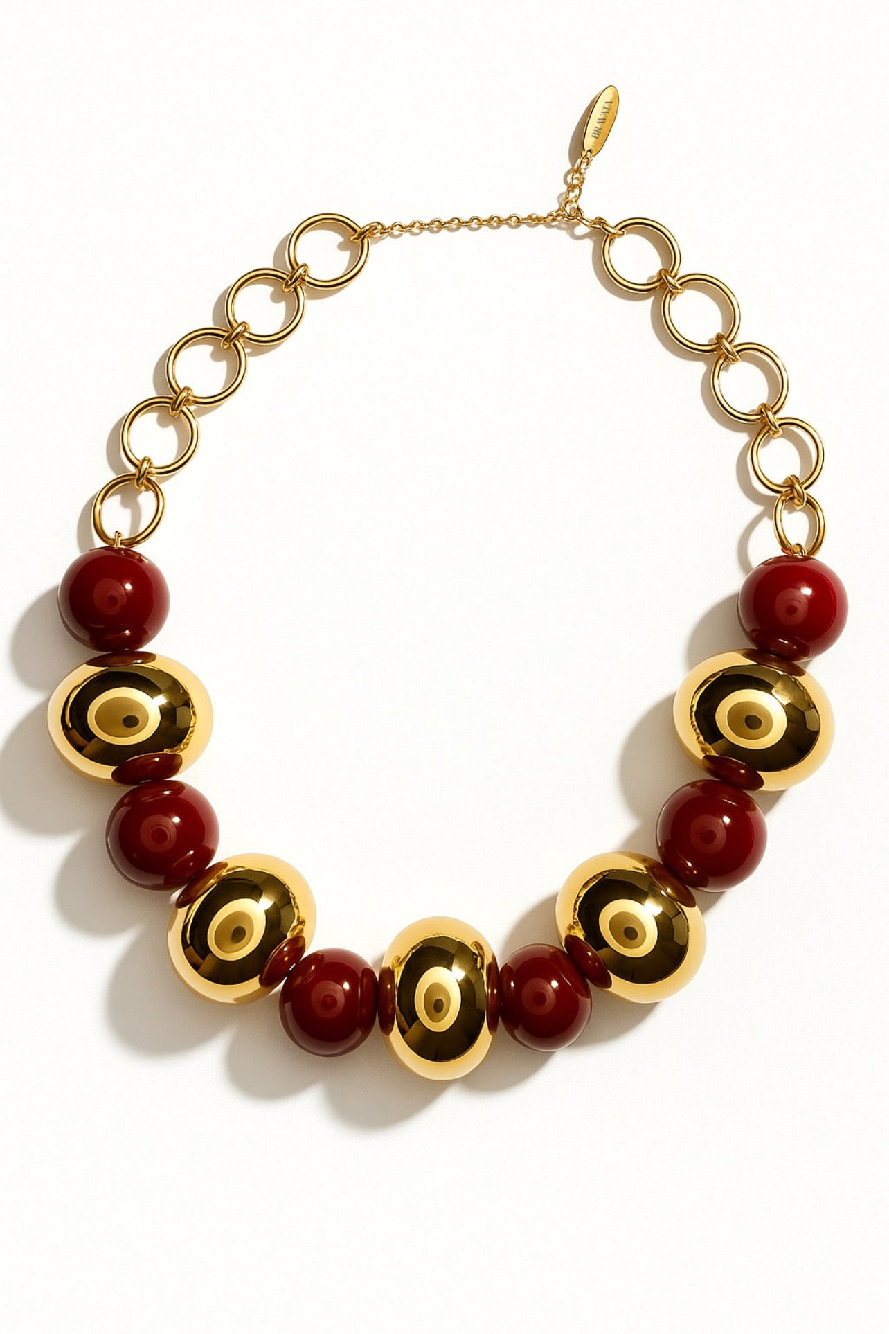 Collar luxury dorado con esferas burdeos y cadena de eslabones redondos