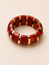 Pulsera Carmesia BRAVATA roja con detalles dorados