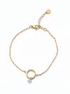 Pulsera dorada con aro central y circonita colgante, en acero con baño de oro 18K