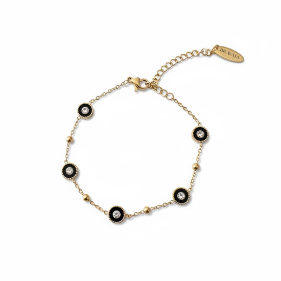 Pulsera dorada con mini discos negros y circonitas, ajustable