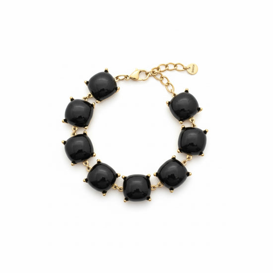 Pulsera dorada con gemas negras cuadradas en talla cushion