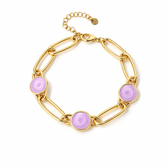 Pulsera dorada de eslabones con tres cabujones rosa en acero con baño de oro 18K