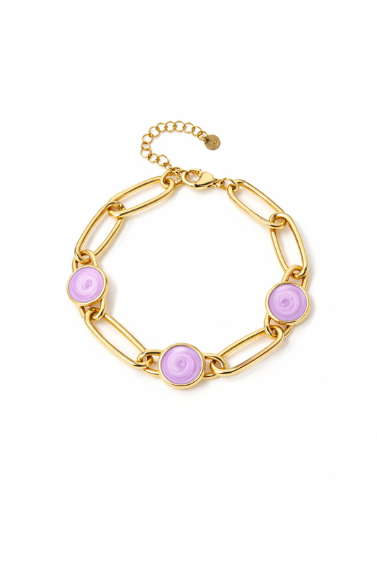 Pulsera dorada de eslabones con tres cabujones rosa en acero con baño de oro 18K
