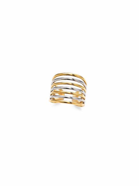 Anillo ancho bicolor de BRAVATA con siete bandas curvas alternadas en acabado dorado y plateado.