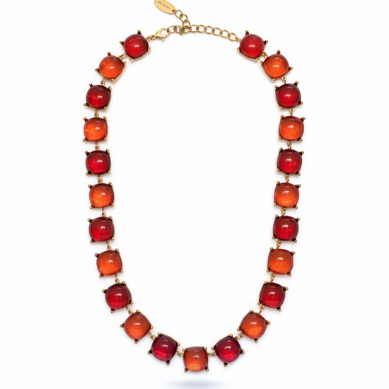 Collar cushion dorado con piedras rojas y naranjas estilo elegante con cápsula de recuerdos opcional Bravata