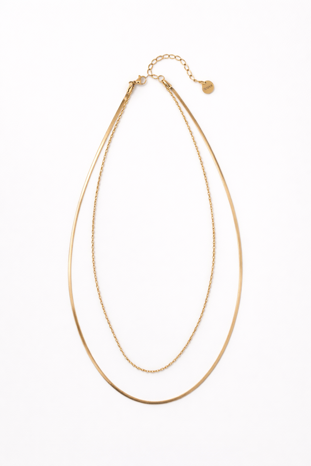 Collar dorado de doble cadena fina estilo minimalista elegante para layering Bravata
