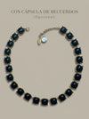 Collar dorado con piedras negras y cápsula de recuerdos opcional Bravata