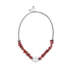 Collar de mujer en plata con cuentas rojas y detalle de flor diseño elegante y moderno