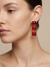Pendientes largos rojos elegantes con piedras brillantes