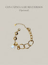 Pulsera dorada de eslabones minimalistas con cápsula de recuerdos opcional Bravata