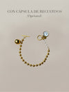 Pulsera dorada con bolas y cápsula de recuerdos opcional Bravata