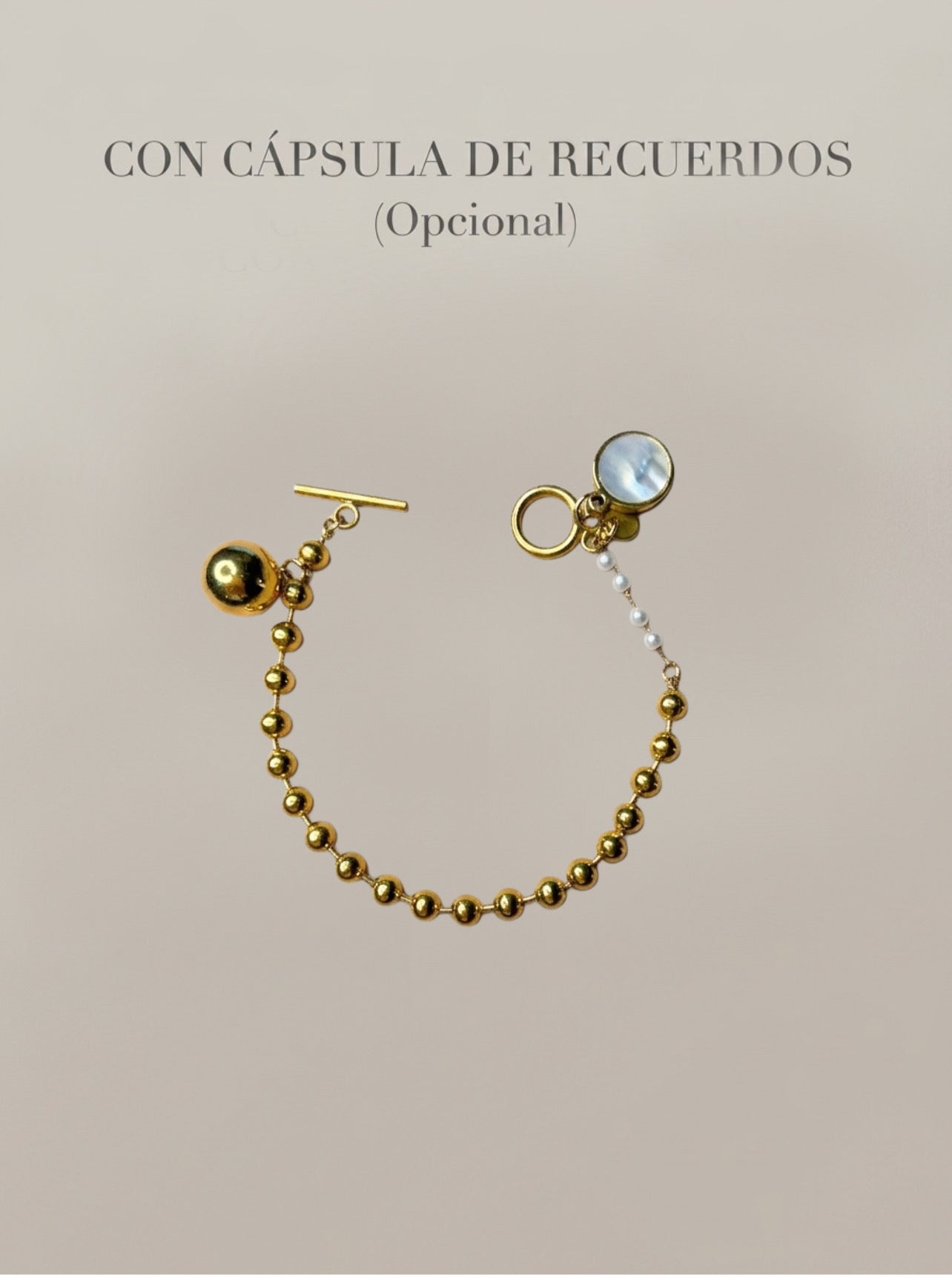Pulsera dorada con bolas y cápsula de recuerdos opcional Bravata