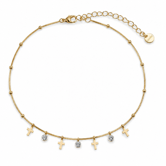 Pulsera Celeste dorada con cruces colgantes, circonitas blancas y cadena ajustable de BRAVATA.