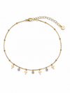 Pulsera Celeste dorada con cruces colgantes, circonitas blancas y cadena ajustable de BRAVATA.