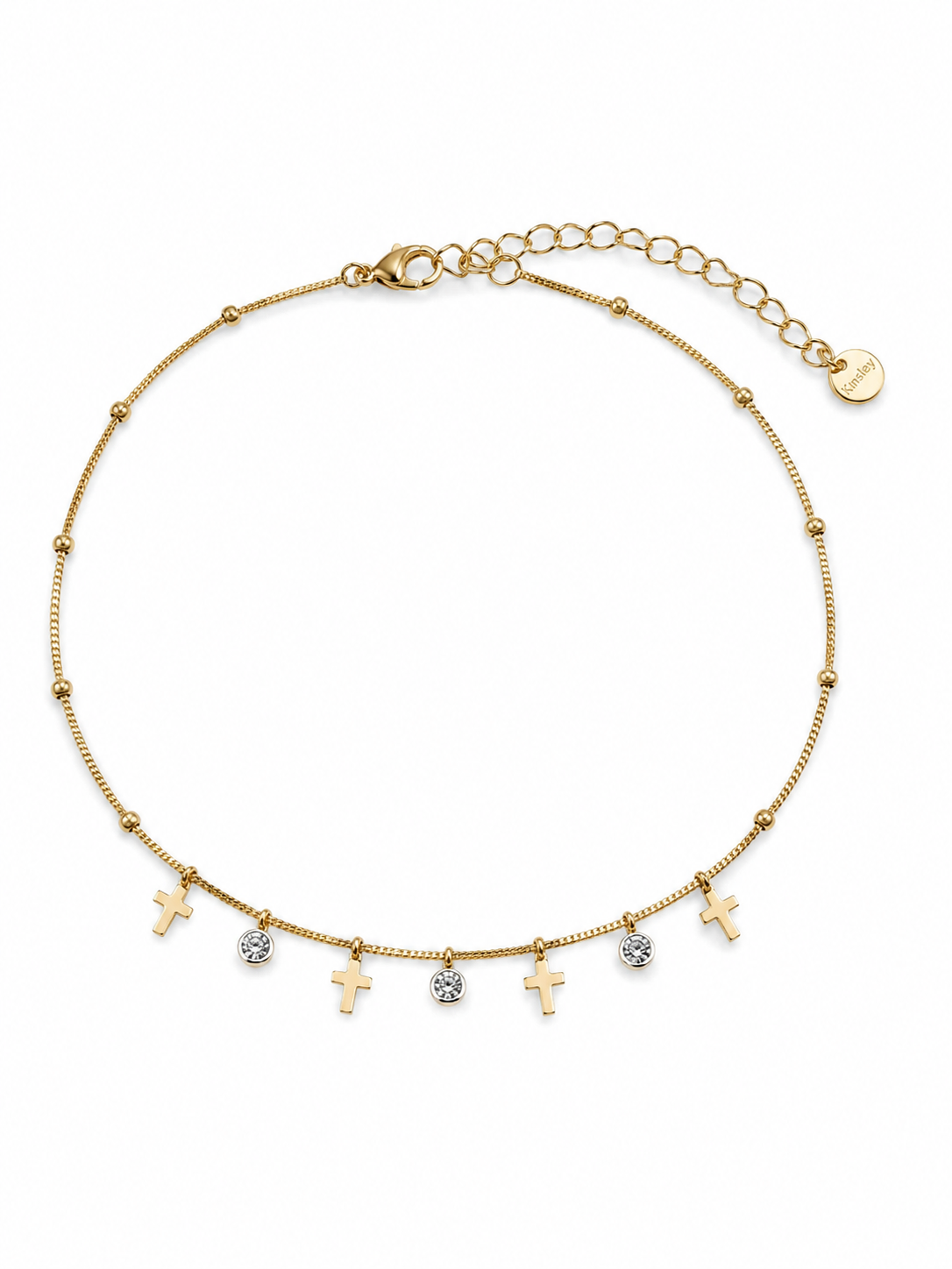 Pulsera Celeste dorada con cruces colgantes, circonitas blancas y cadena ajustable de BRAVATA.