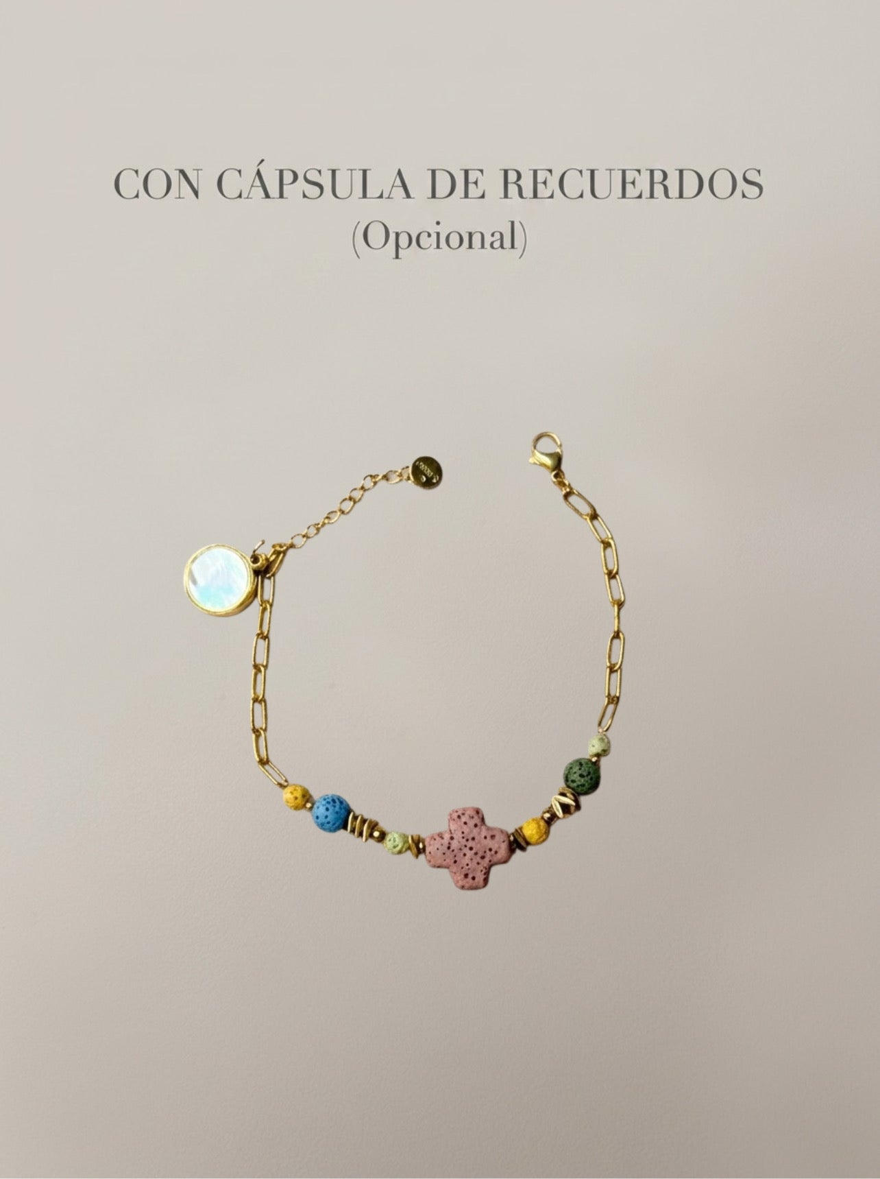 Pulsera con cruz rosa y piedras de colores con cápsula de recuerdos opcional Bravata