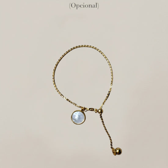 Pulsera dorada minimalista de cadena fina con cápsula de recuerdos opcional Bravata