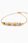 Pulsera dorada con perlas naturales en acero inoxidable, diseño elegante ideal para regalar | Bravata