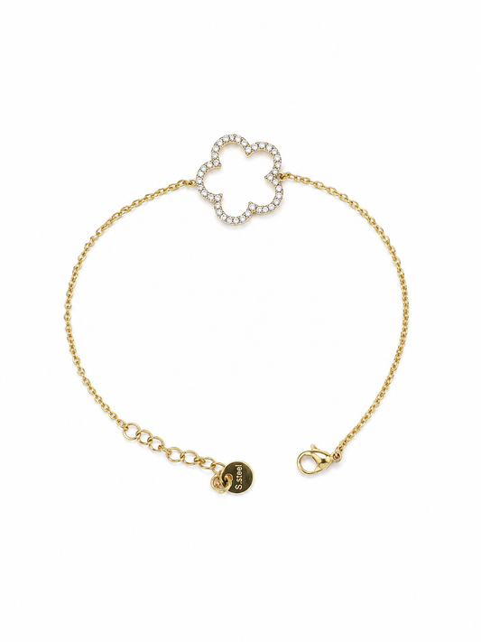 Pulsera Fiore dorada de cadena fina con motivo floral de circonitas blancas de BRAVATA.