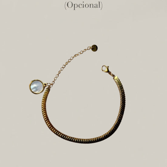 Pulsera rígida dorada con cápsula de recuerdos opcional Bravata