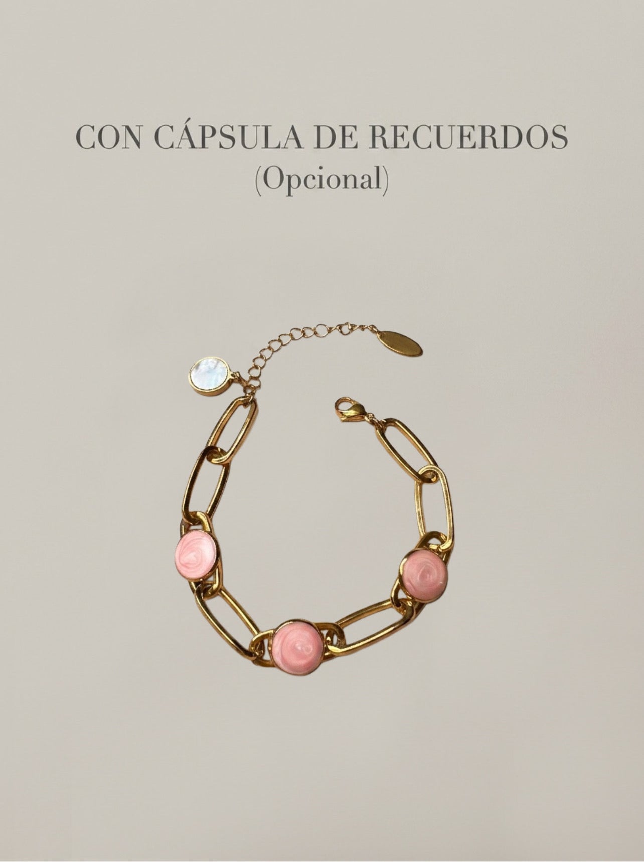 Pulsera dorada con detalles rosados y cápsula de recuerdos opcional Bravata