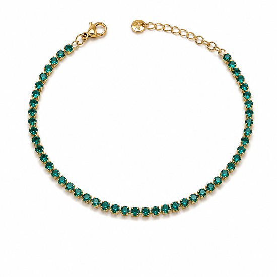 Pulsera Ruby dorada con una fila de circonitas verdes y cierre ajustable de BRAVATA.