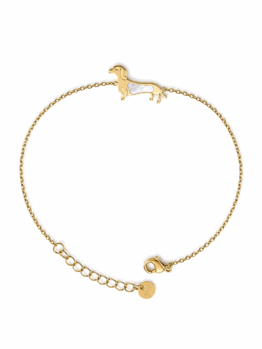 Pulsera Tekel dorada de cadena fina con silueta de perro tekel y detalle nacarado blanco de BRAVATA.